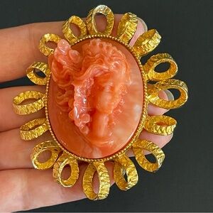 Vintage pauline Rader Gold and faux Coral Cameo Brooch.